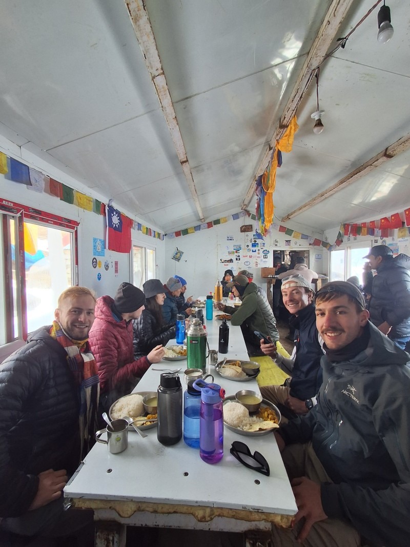 Eating food inside teahouse manaslu