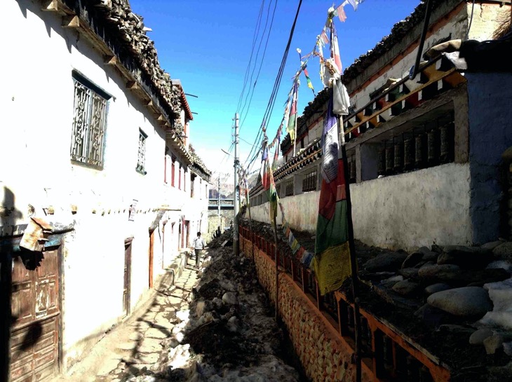 If You Cannot Make To Tibet Go To Mustang Kagbeni Prayer wheels along the street of Kagbeni | Make sure you rotate them clockwise