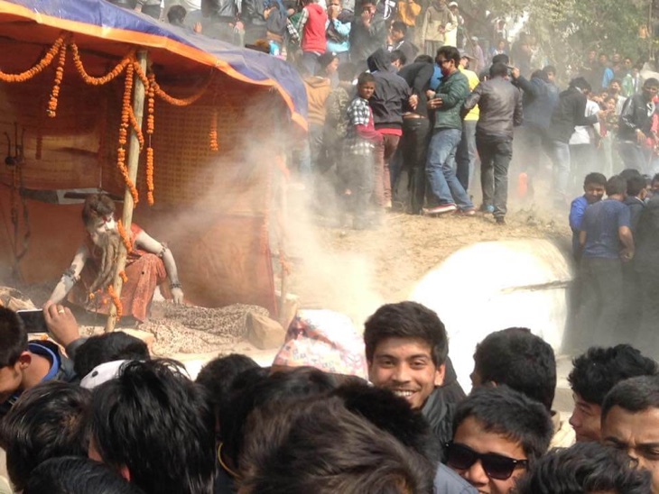 Complete Guide To Enjoy Shivaratri Festival Nepal Sadhus dispersing crowd in Pashupati Nath temple