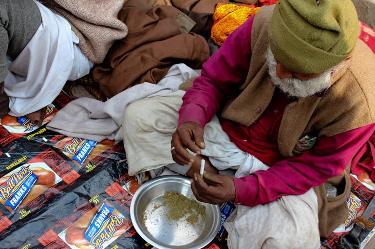Complete Guide To Enjoy Shivaratri Festival Nepal Sadhus smoking weeds and doing meditation